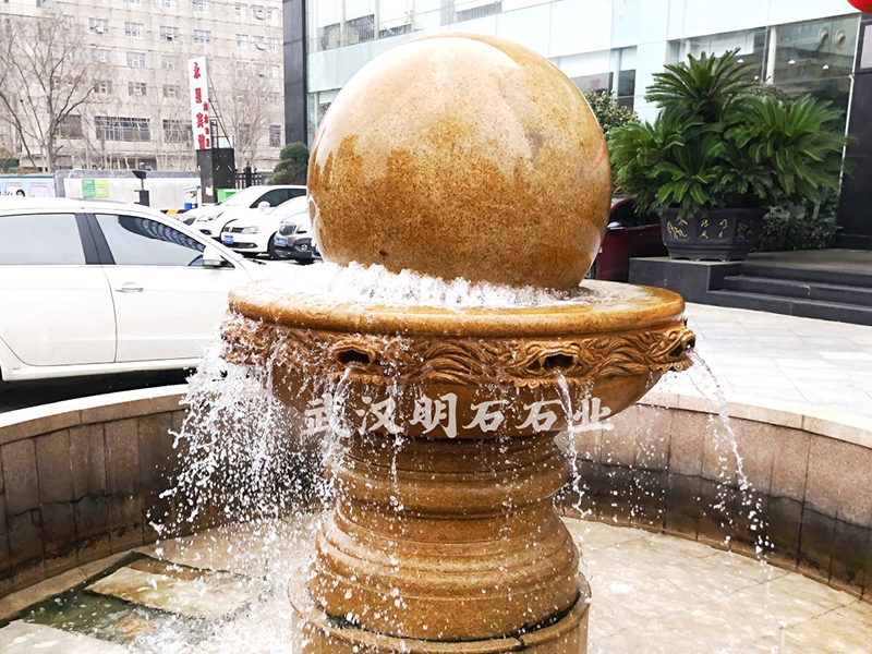 九江银行黄锈石风水球